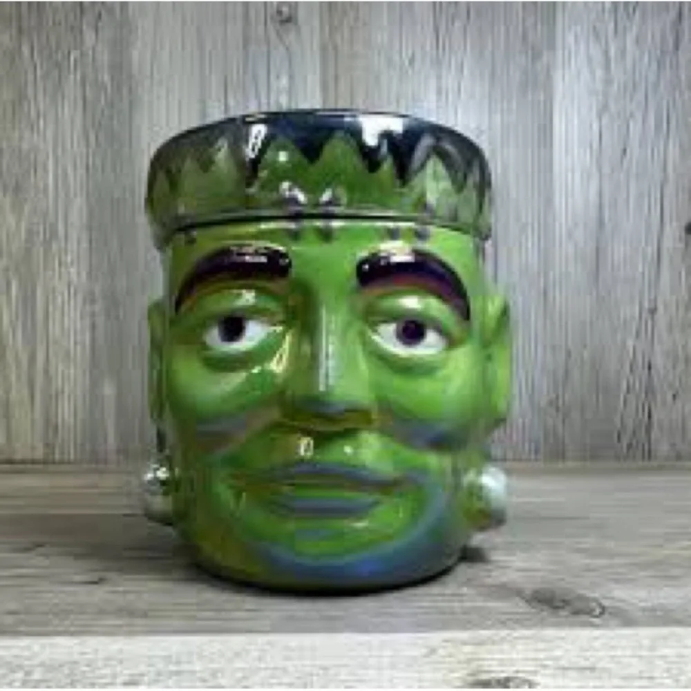 Green Frankenstein oversized candle - bobbing for apples